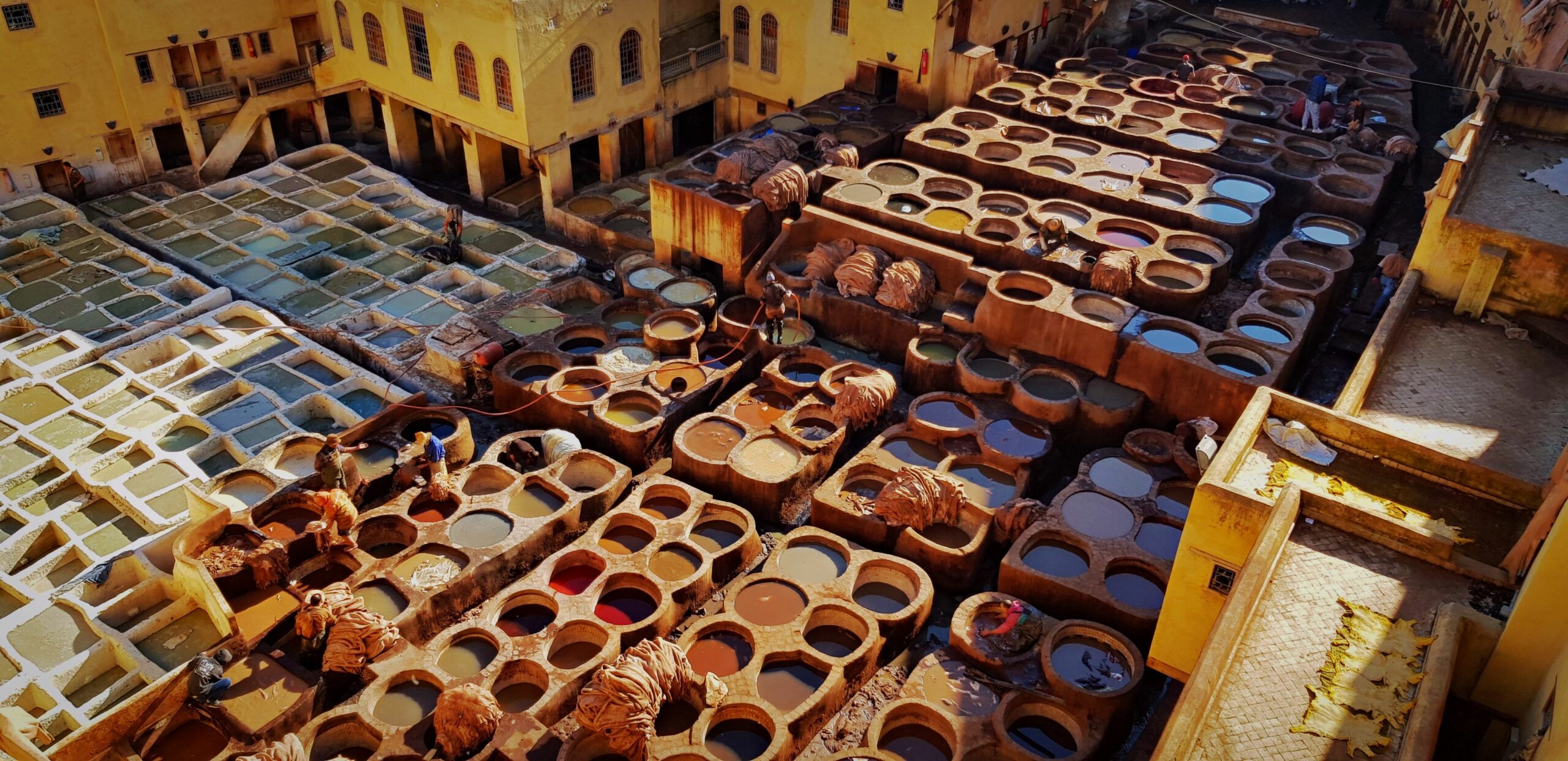 best cities to visit in Morocco 2026 - Fès medina tanneries aerial view